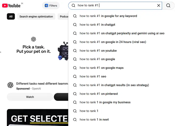 YouTube search bar showing autocomplete suggestions after typing a partial topic.